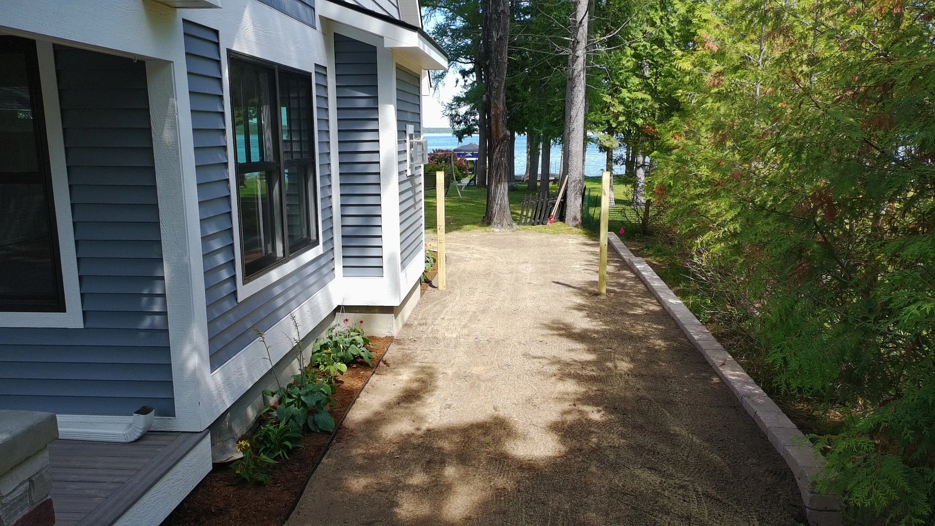 Gallery photos for Paver Walkways and Fresh Plantings Finish This Lakeside Home Right: Image #3