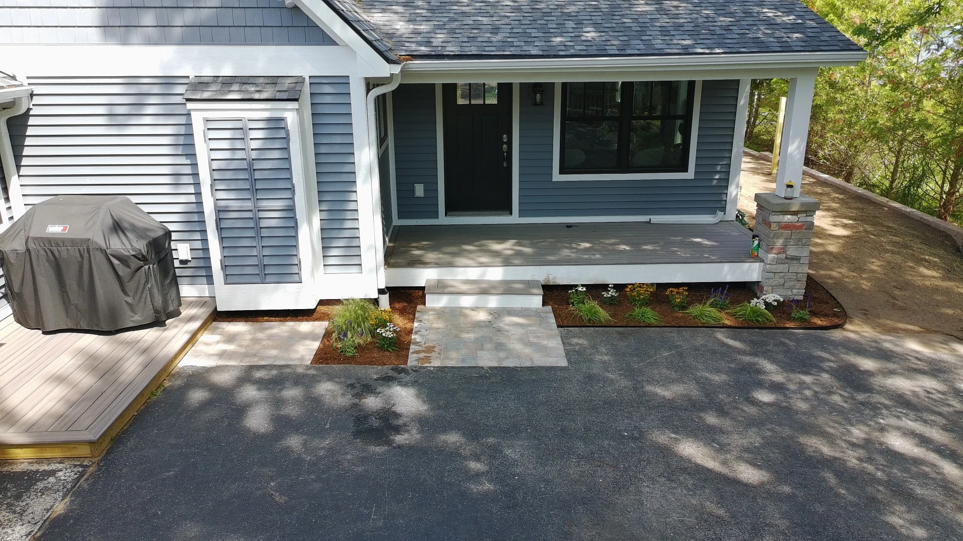 Paver Walkways and Fresh Plantings Finish This Lakeside Home Right image