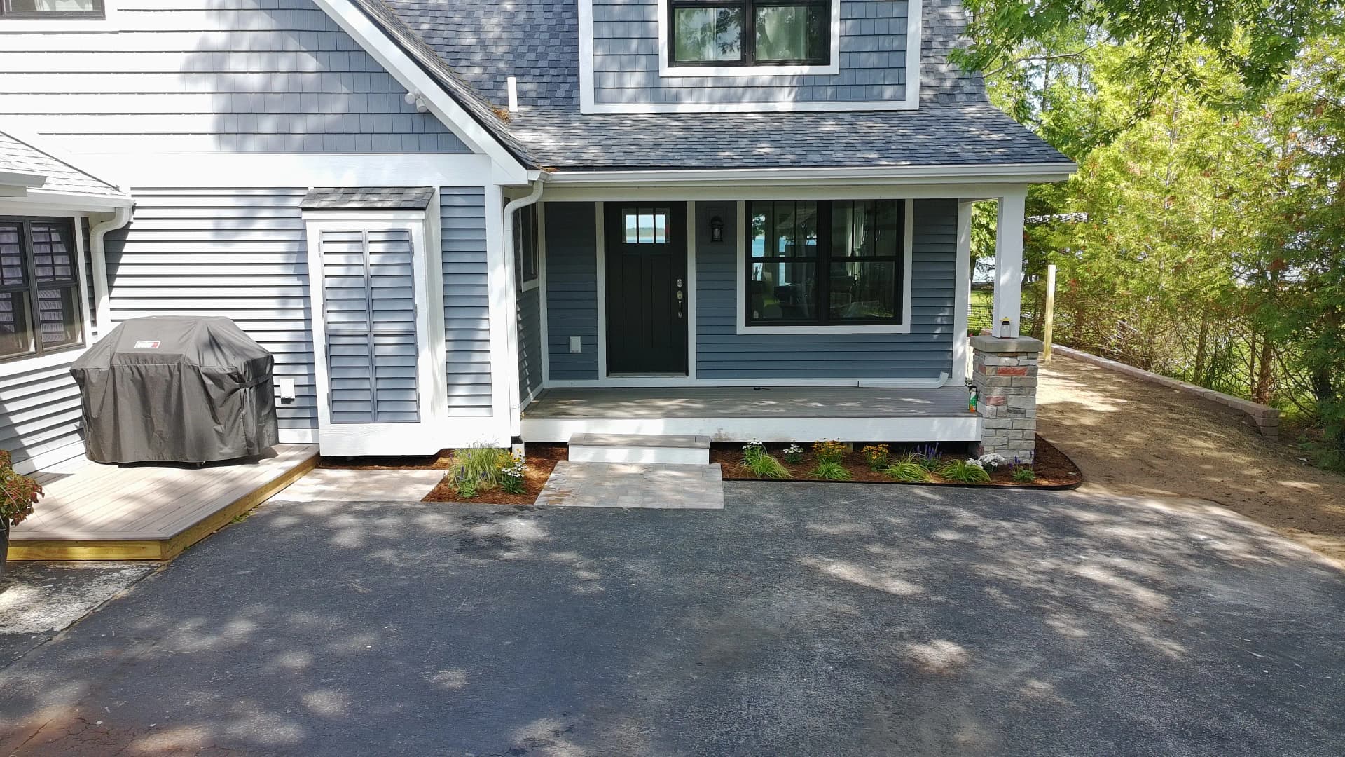 Gallery photos for Paver Walkways and Fresh Plantings Finish This Lakeside Home Right: Image #1