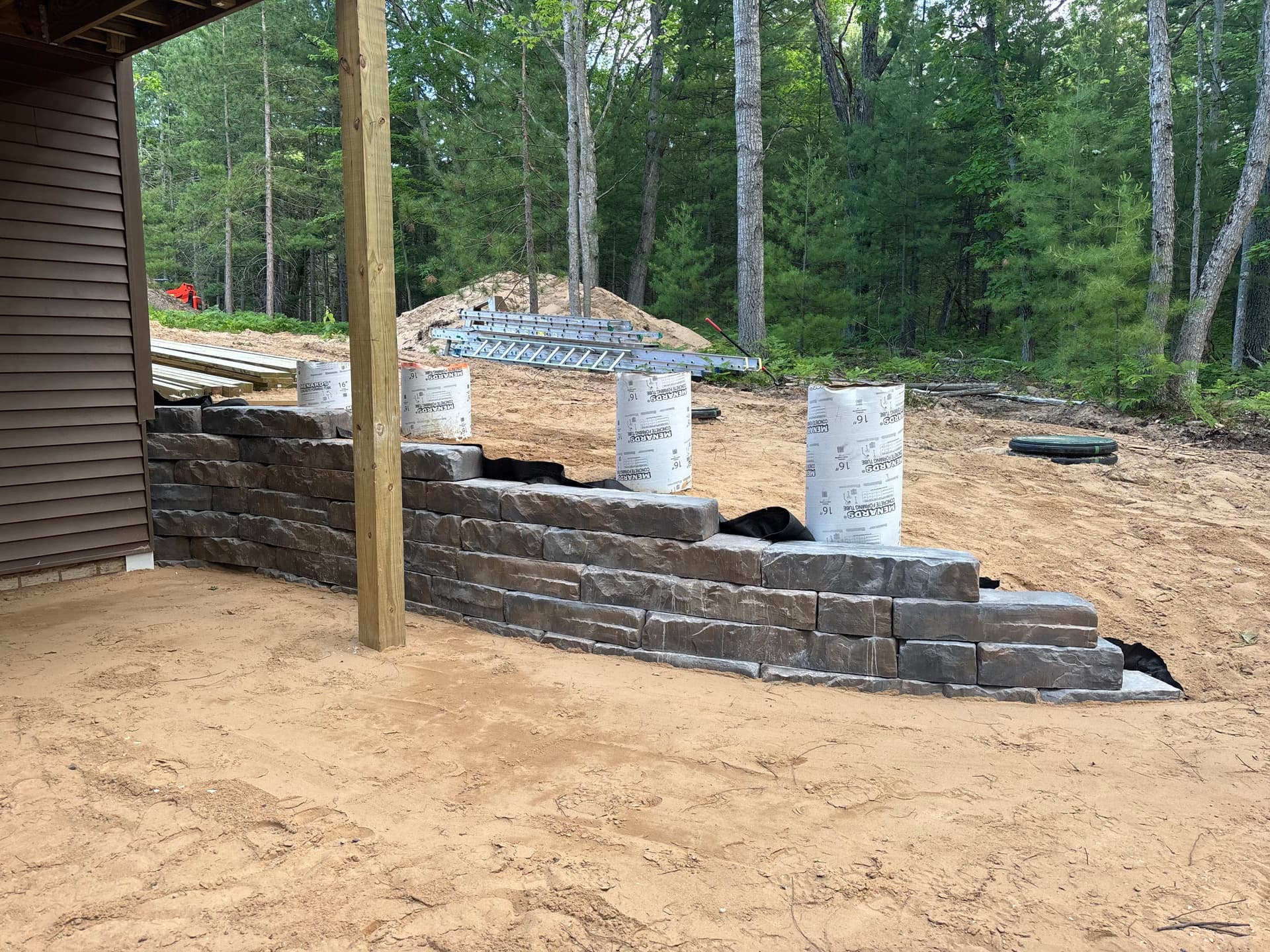 Gallery photos for Basement Walkout Retaining Wall Built to Match the Land: Image #3