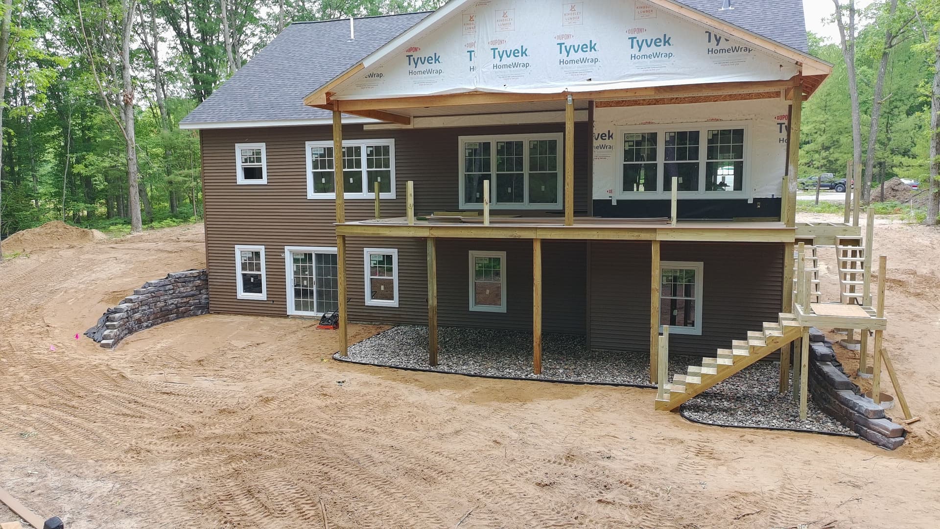 Gallery photos for Basement Walkout Retaining Wall Built to Match the Land: Image #1