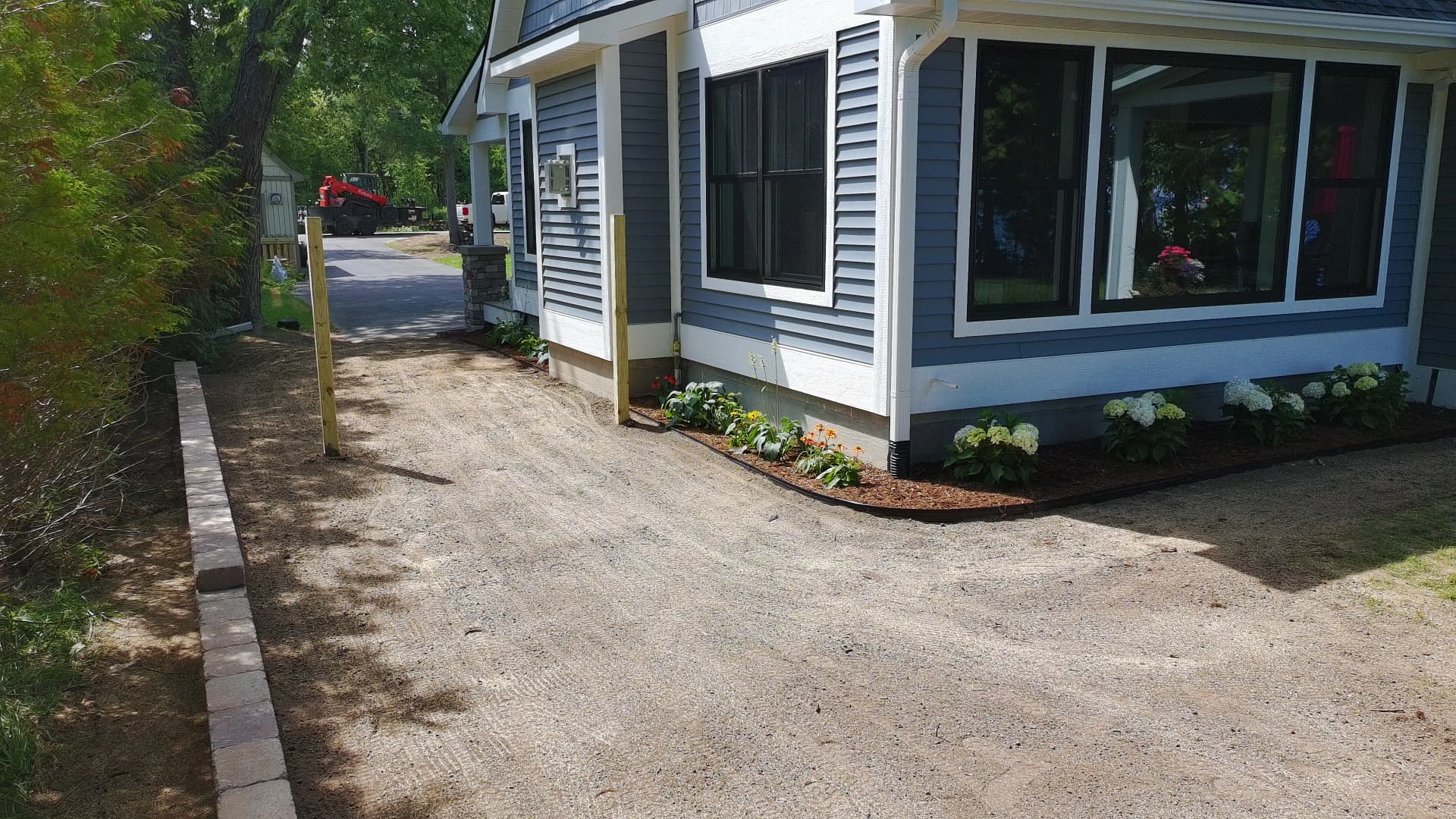 Gallery photos for Paver Walkways and Fresh Plantings Finish This Lakeside Home Right: Image #4