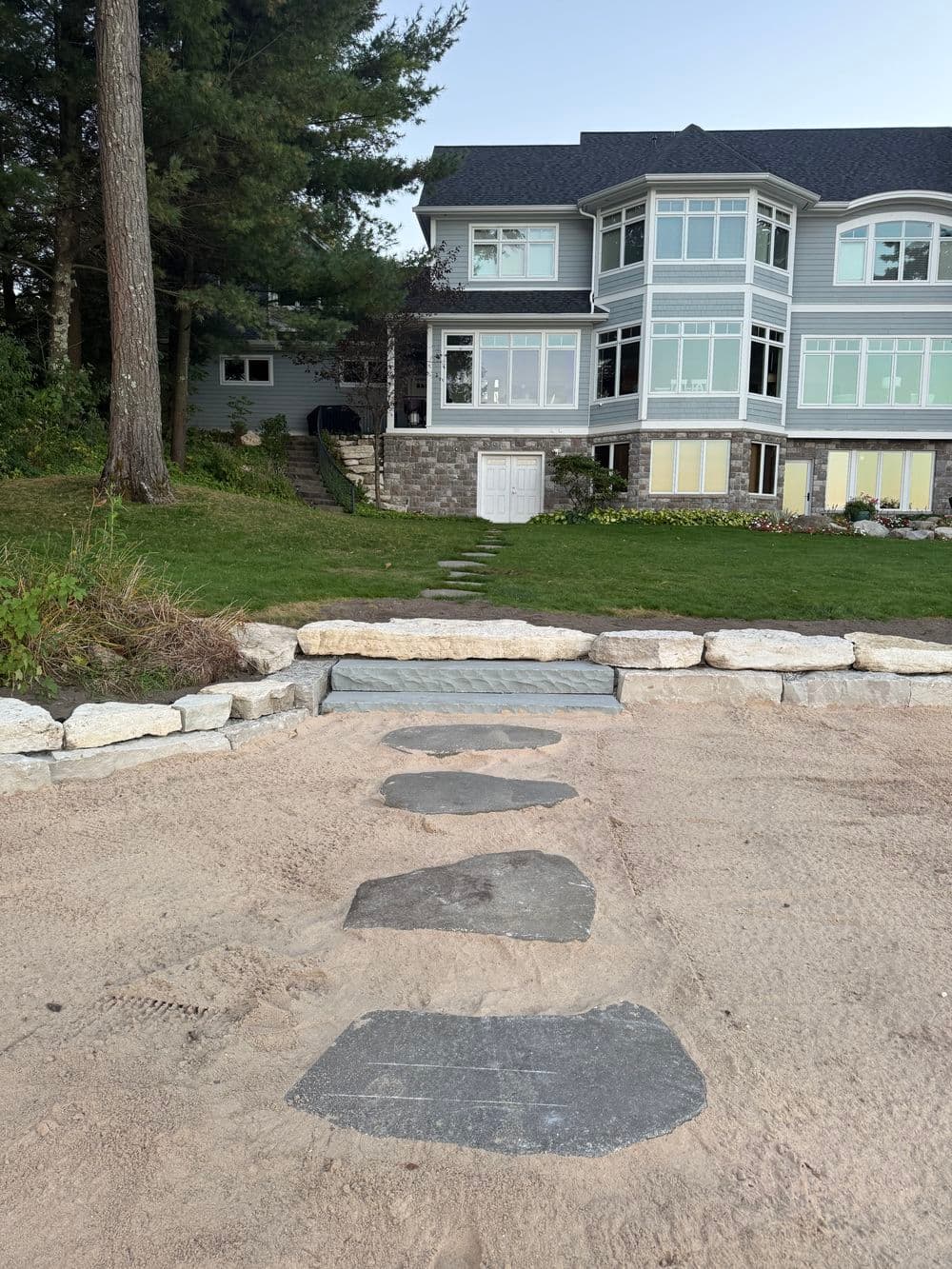 Project Limestone Outcroppings and NY Bluestone Steps Fix a Failing Beach Transition image